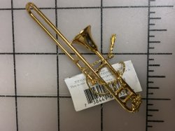 #3327 Plated metal trombone.