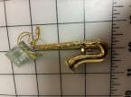 #3328 Plated metal sax.